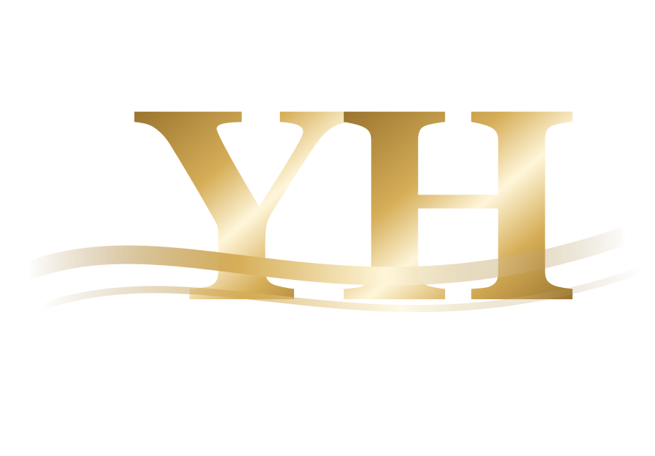 The YahHeard YH monogram in gold